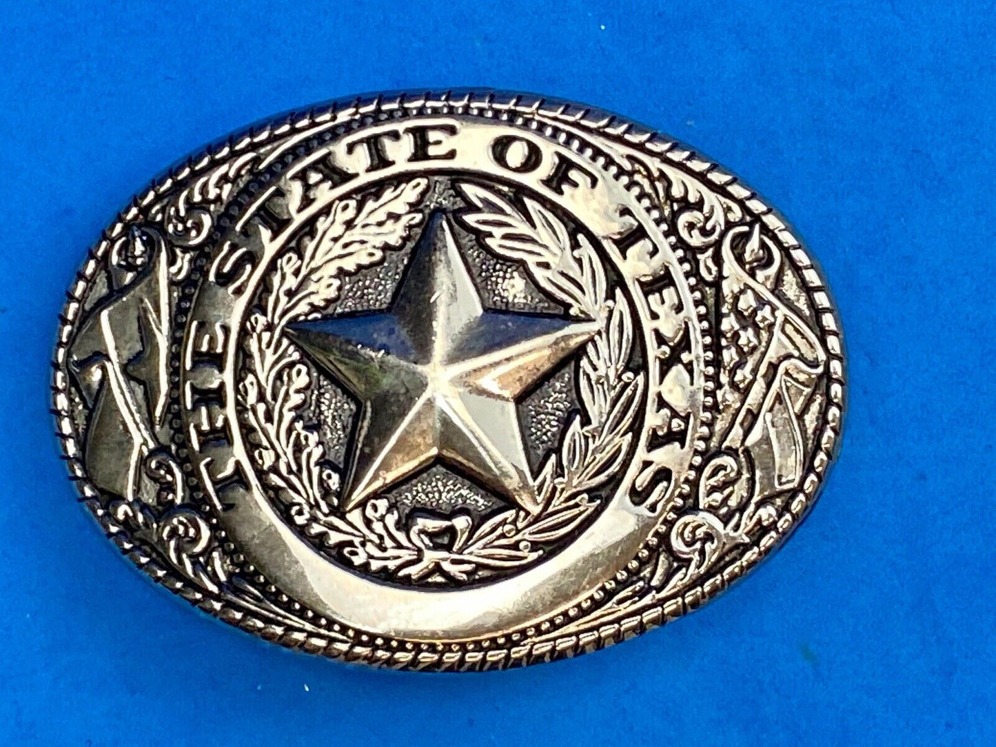 THE GREAT STATE OF TEXAS Star Black and Silver color flower swirl belt buckle