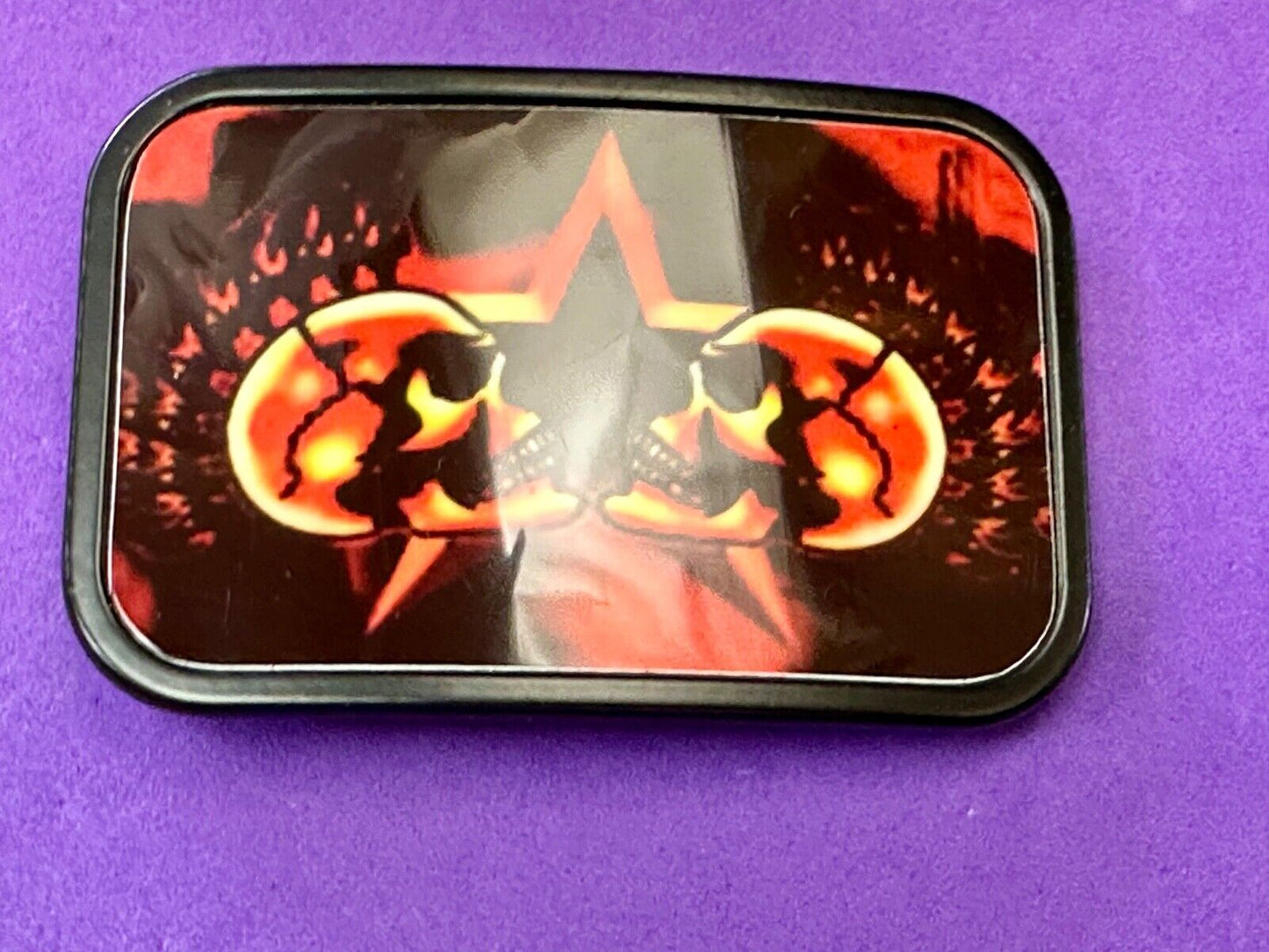Two Skulls around star picture - black & red color rectangular belt buckle