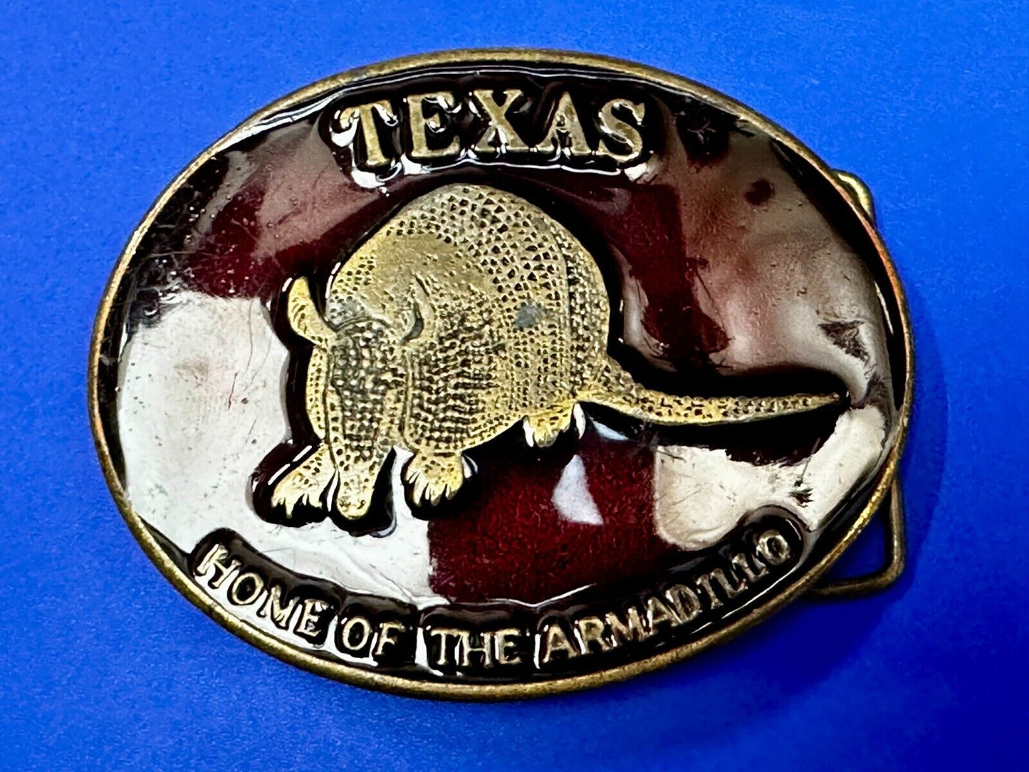Texas Home of the Armadillo Commemorative Red colored Belt Buckle by Koleaco