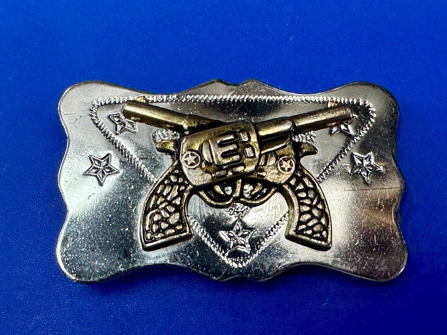 Vintage Cowboys Six Shooter gun's crossed western two tone belt buckle
