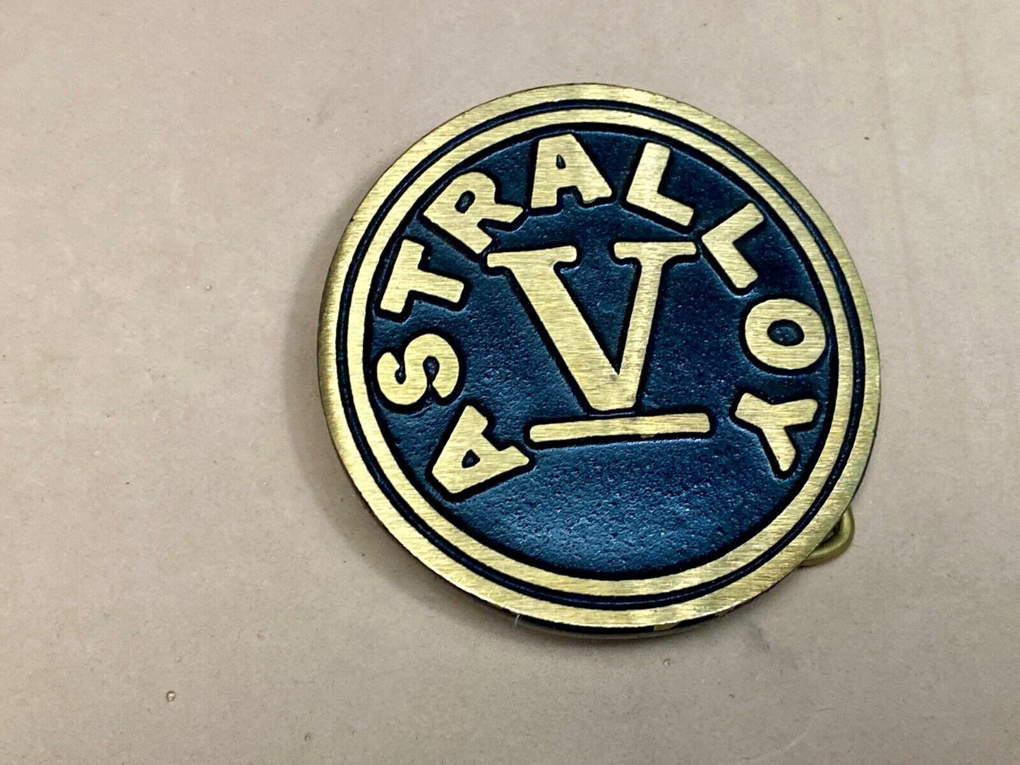 Astralloy Vis a unique, deep-air hardened steel promotional brass belt buckle