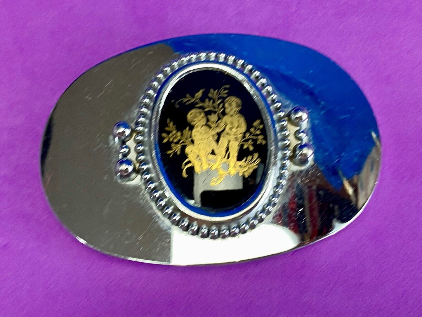 Antique? Mirrored belt buckle centerpiece picture of Adorable Kids w/ flowers