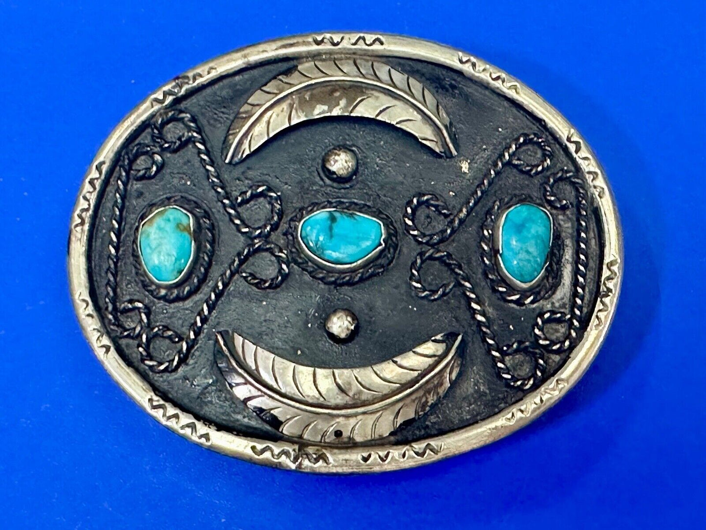 Turquoise stones raised feathers vintage belt buckle marked Sterling 0925 Mexico