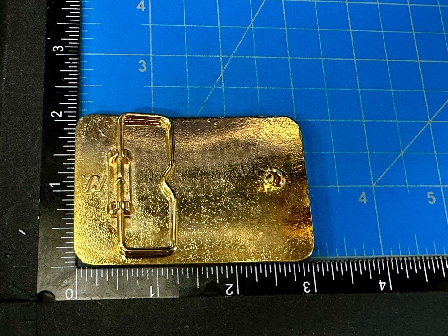 Austin Texas Distributing and Manufacturing 1987 Gold Tone Belt Buckle