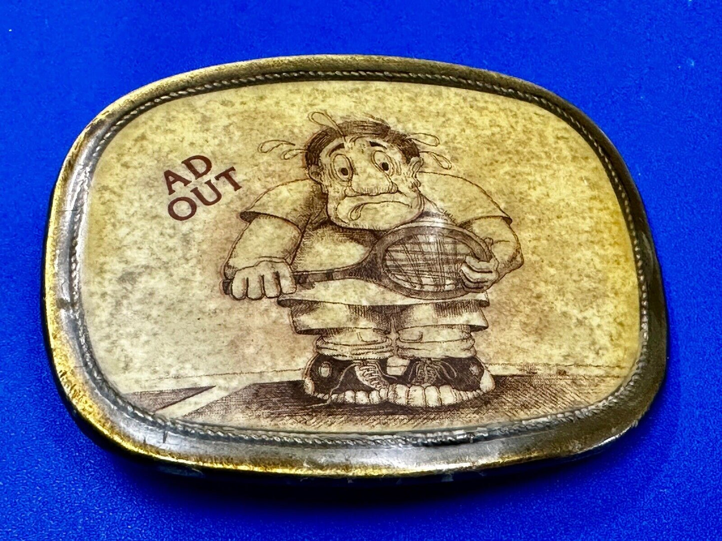 Vintage Cartoon Man AD OUT - Tennis Game Match Retro Sports Belt Buckle