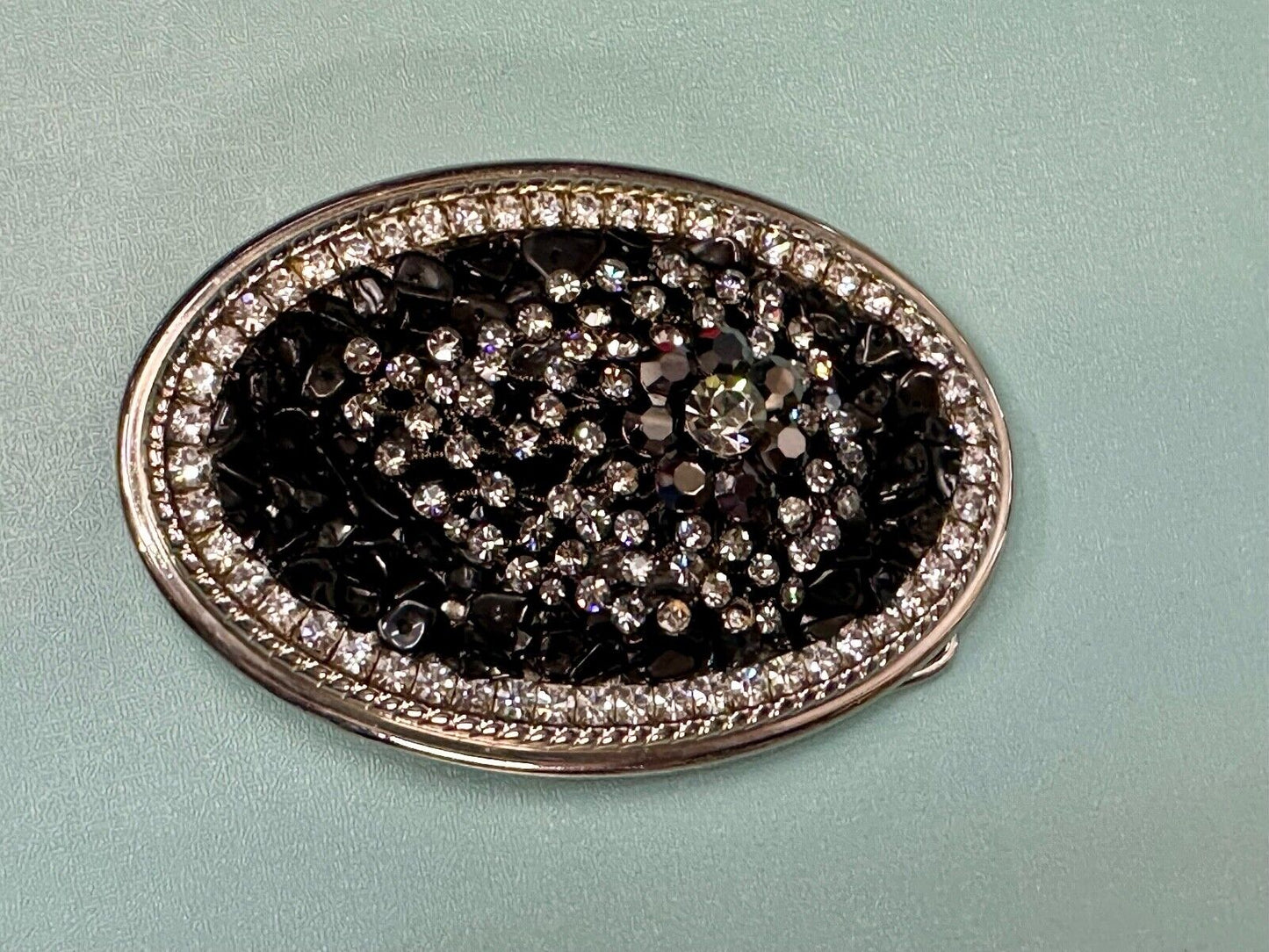 Artisan GHOST? Abstract animal head belt buckle covered in black rhinestone's