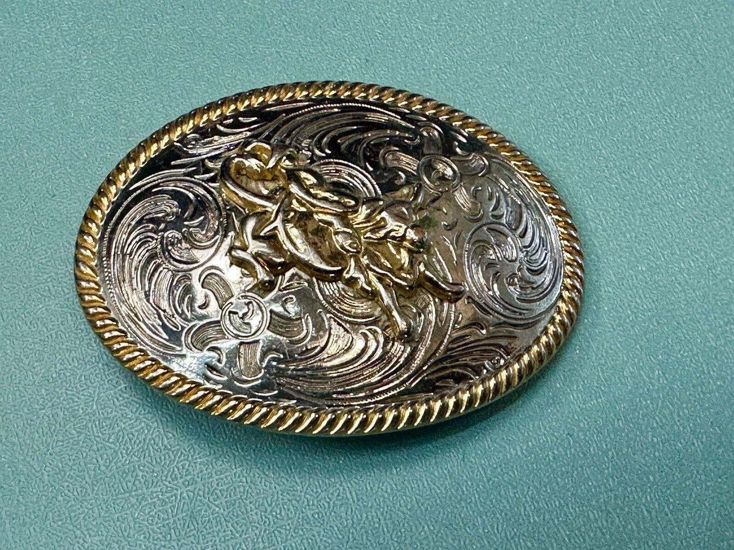 2.5" wide Two tone Vintage western rodeo cowboy belt buckle.