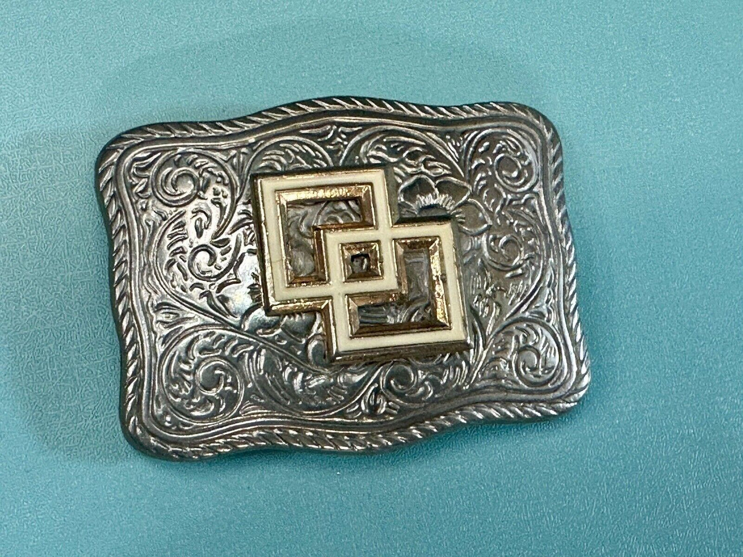 Two Squares pattern - centered in western flower swirl design belt buckle