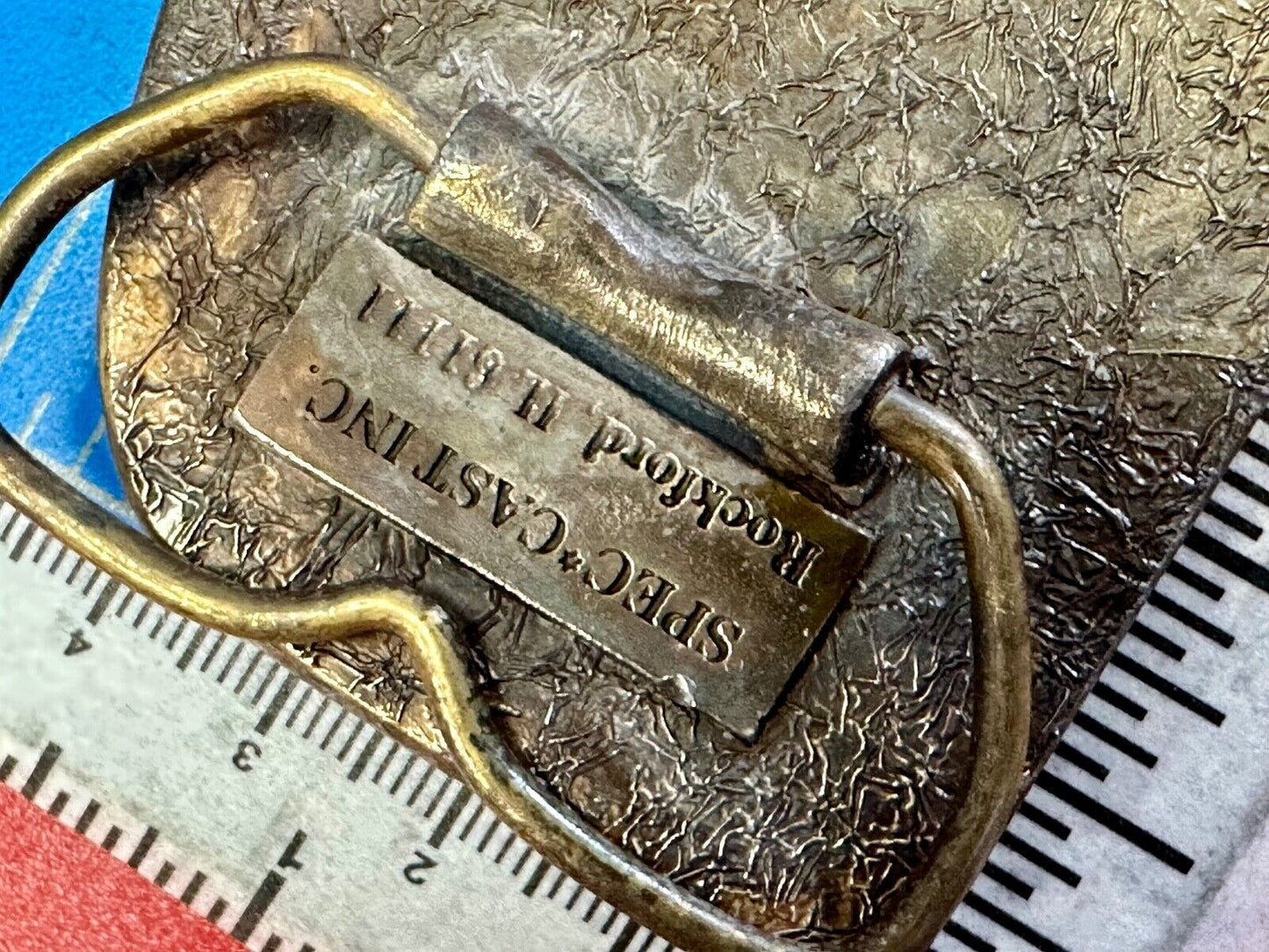 The Tough Tire Team BRi Brad Ragan, Inc. vintage belt buckle by Spec-Cast