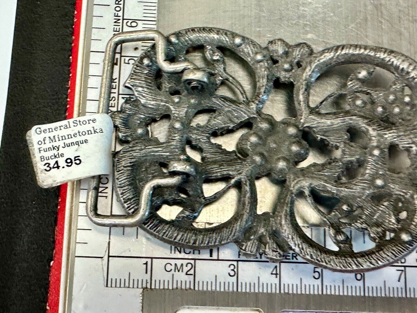 Black rhinestone accented metal flower pattern NOS Funky Junque belt buckle