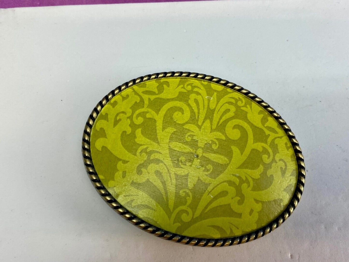 Vintage bright lime green wallpaper pattern belt buckle by Ivan