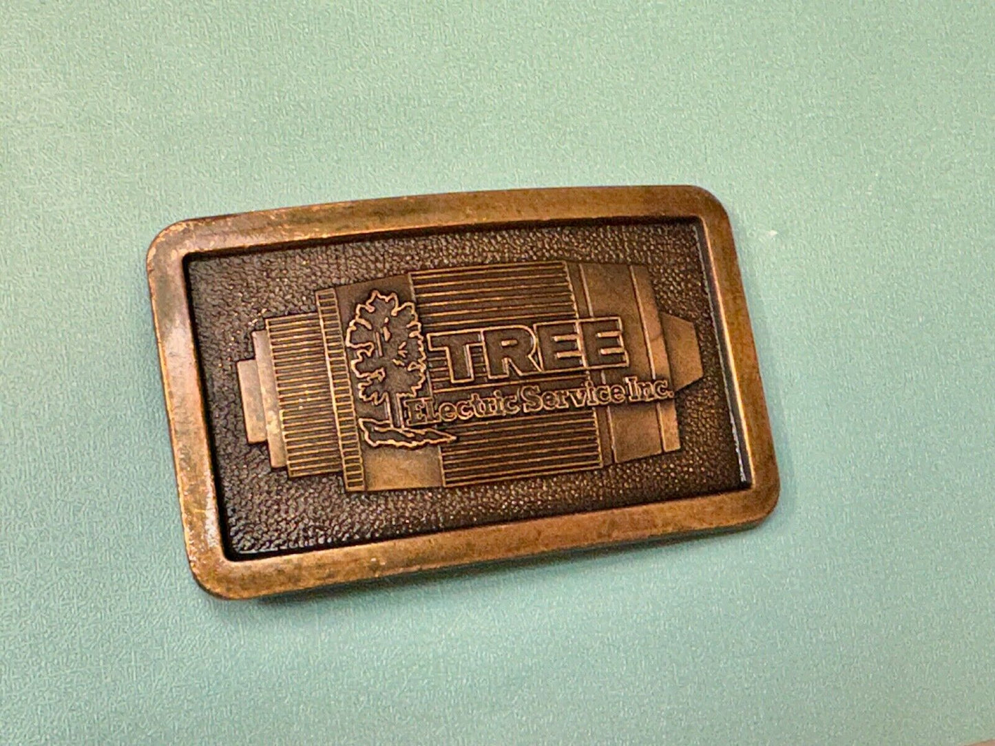 Tree electric service INC Vintage advertising promo brass tone Belt Buckle