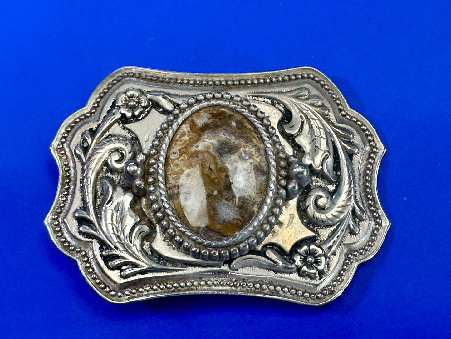 Vintage cabochon cab stone centerpiece on western silver tone belt buckle