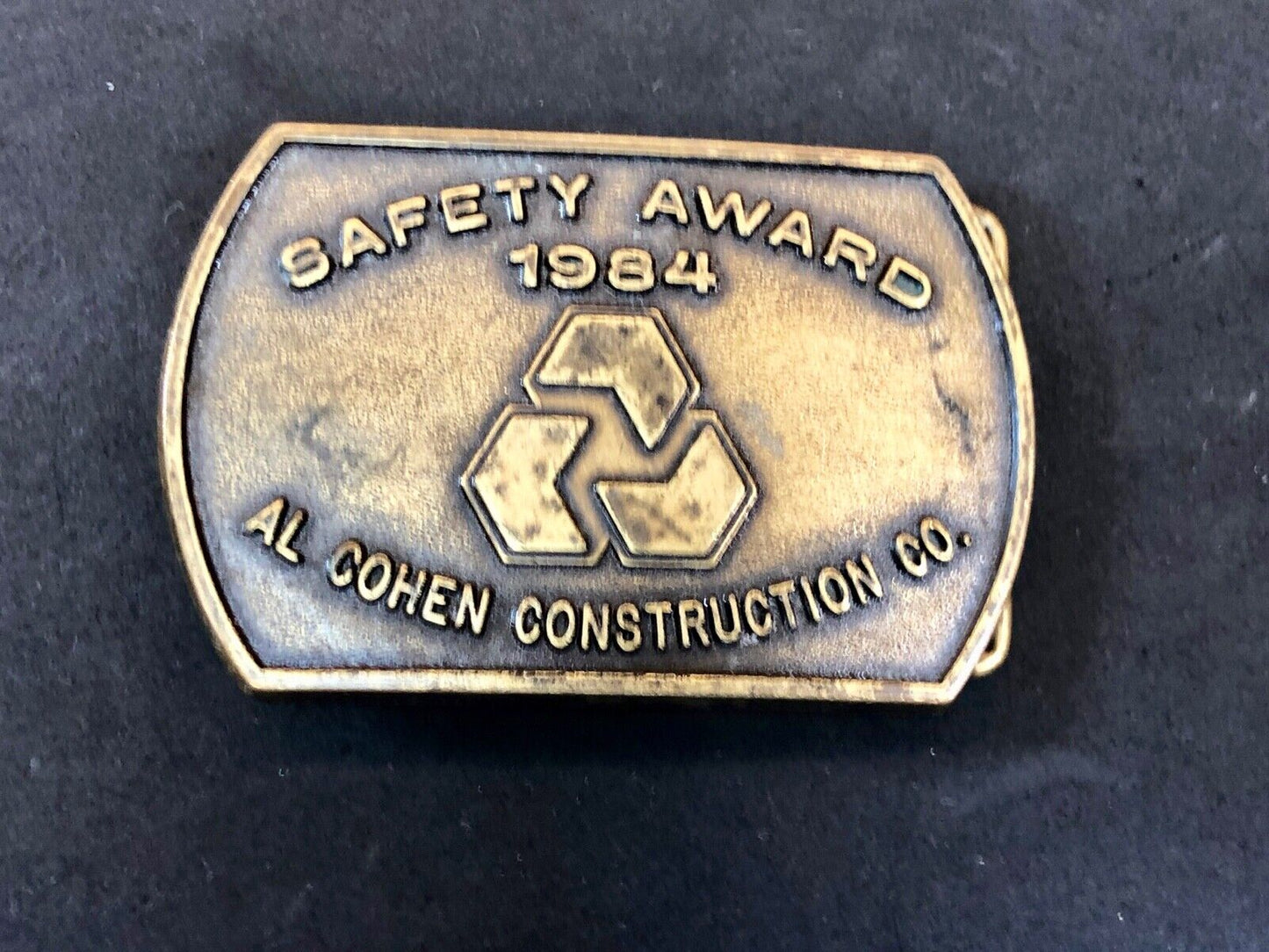 Vintage 1984 AL Cohen Construction Company promotional belt buckle safety award