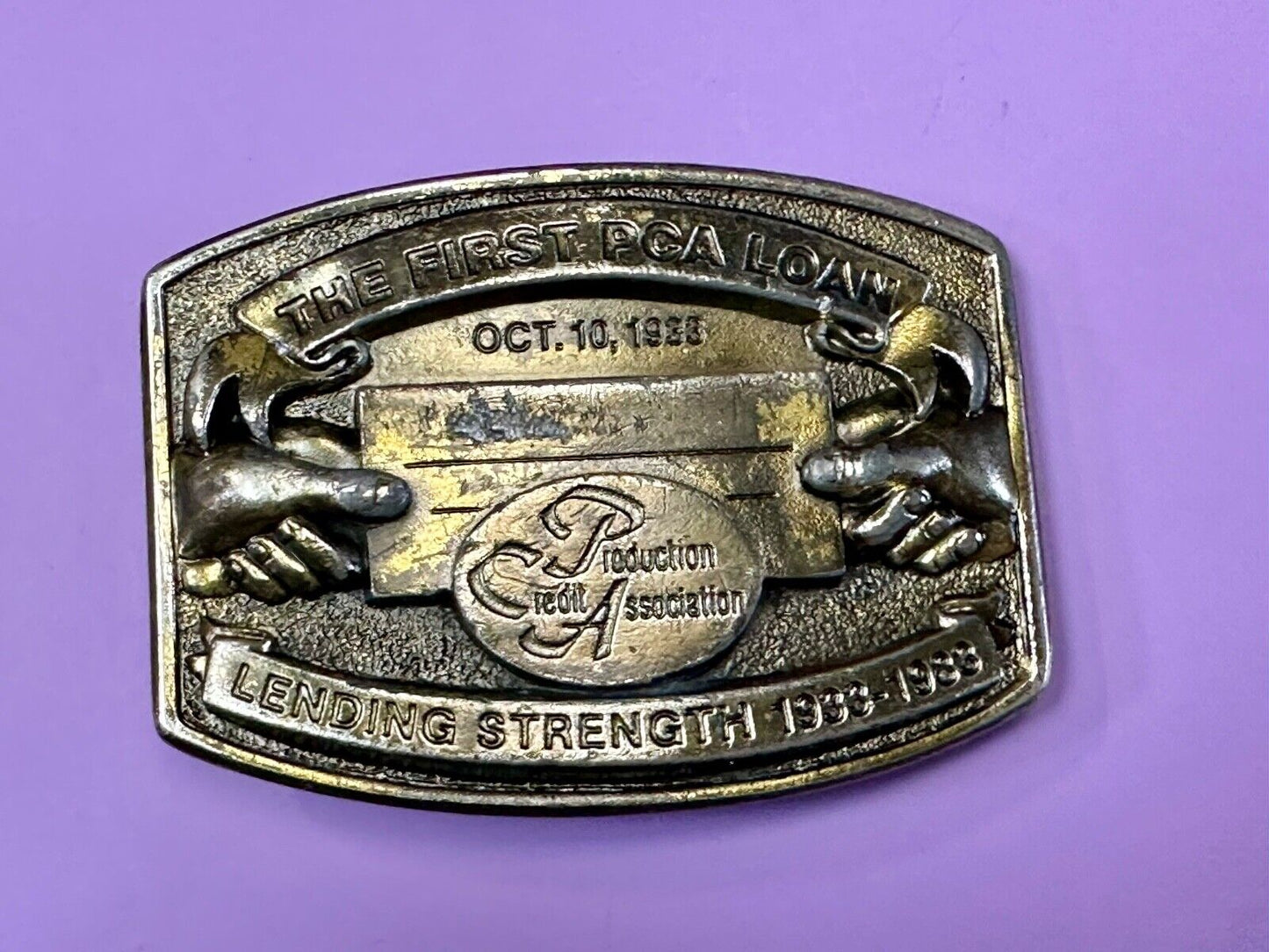 The First PCA loan Production Credit - Vintage The Great American Belt Buckle Co