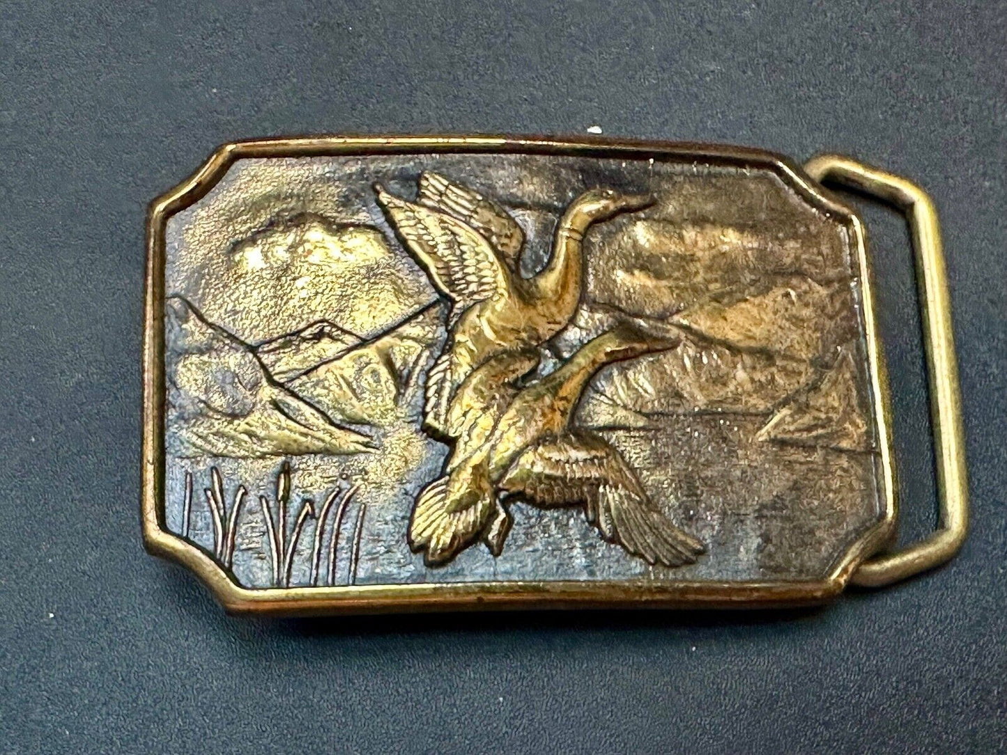 Two ducks flying from pond cat tails Nature Solid Brass belt buckle by BTS