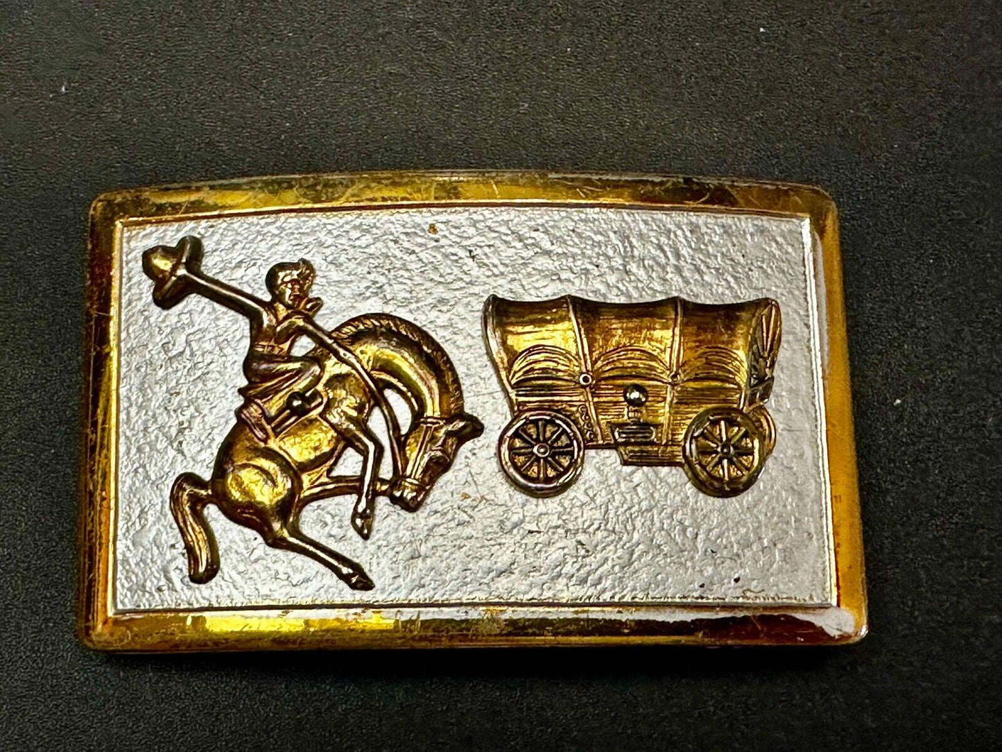 Vintage Cowboy Saddle Bronc western Covered wagon gold tone belt buckle