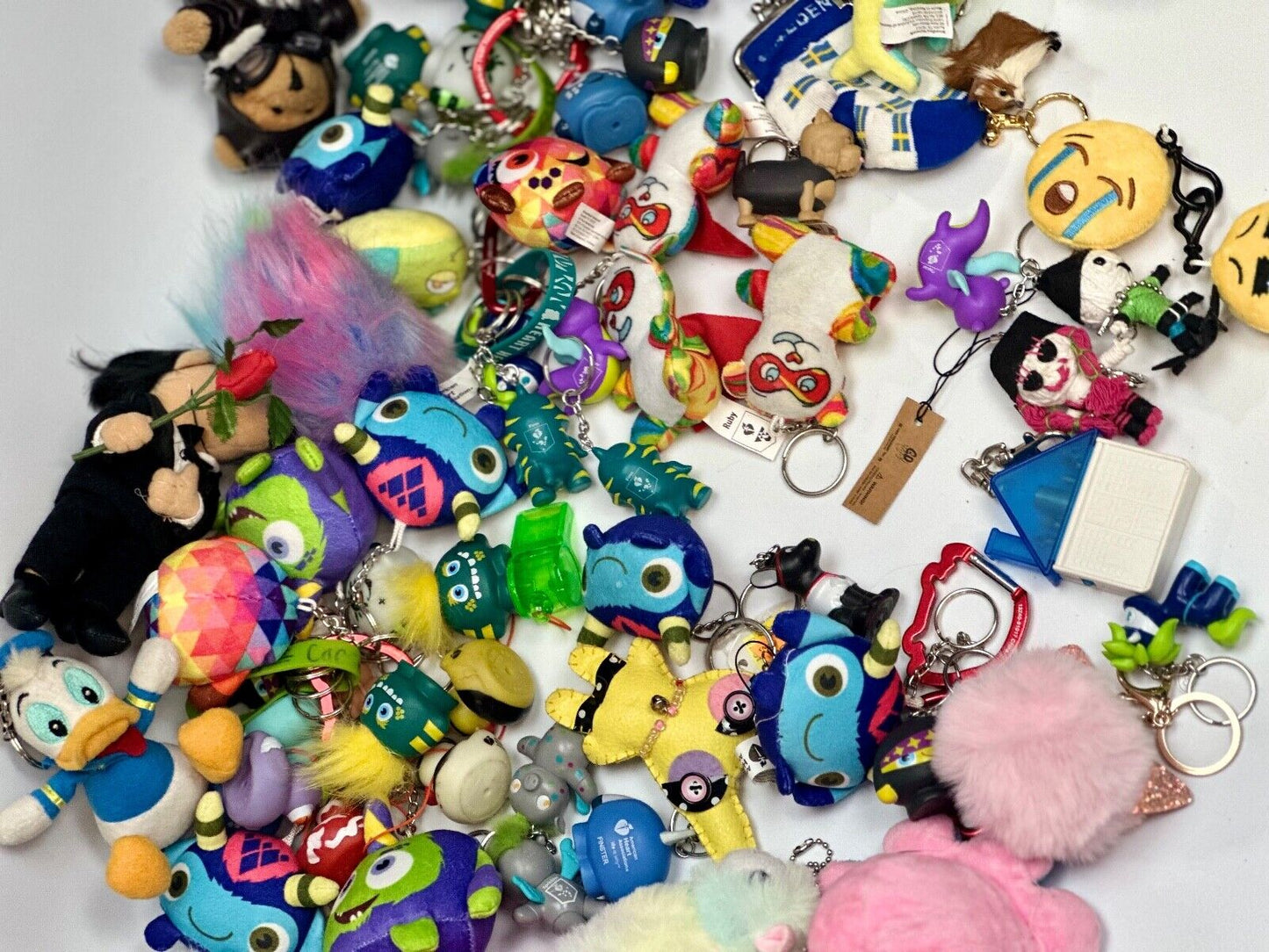 Around 75 plush doll Keychains Resale Bulk Lot, Junk Drawer Grab Bag