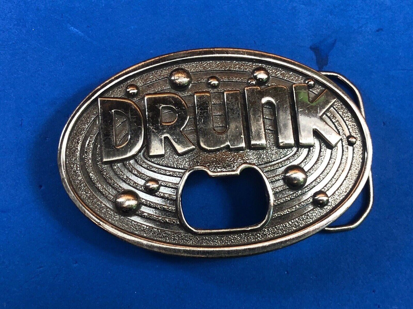 vintage large metal Bottle Opener / belt buckle - words DRUNK Beer glass party