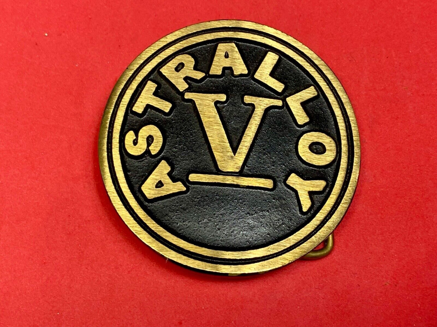 Astralloy Vis a unique, deep-air hardened steel promotional brass belt buckle