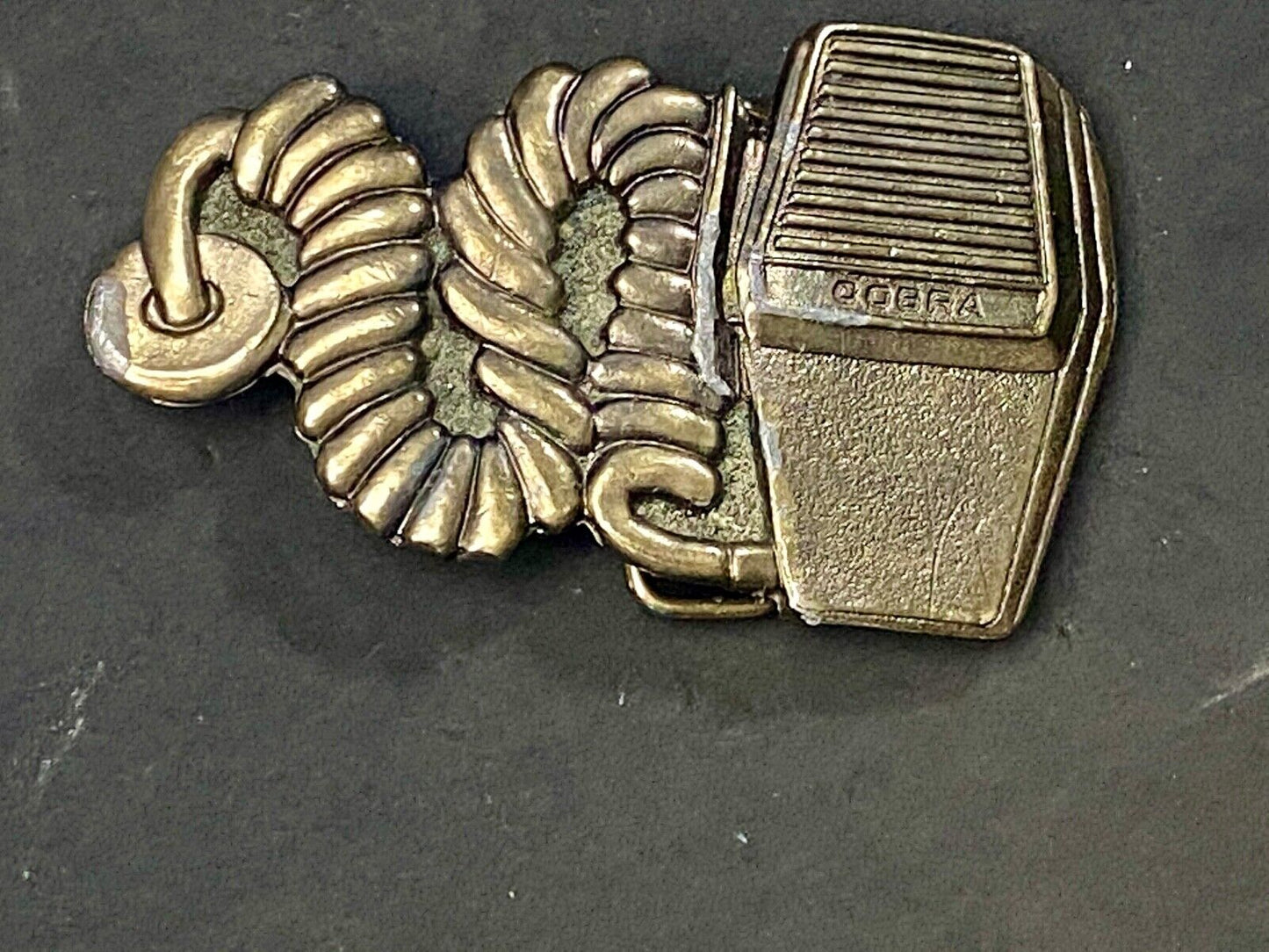 Vintage 1977 Cobra Handheld CB HAM Radio The Great American Belt Buckle Co.
