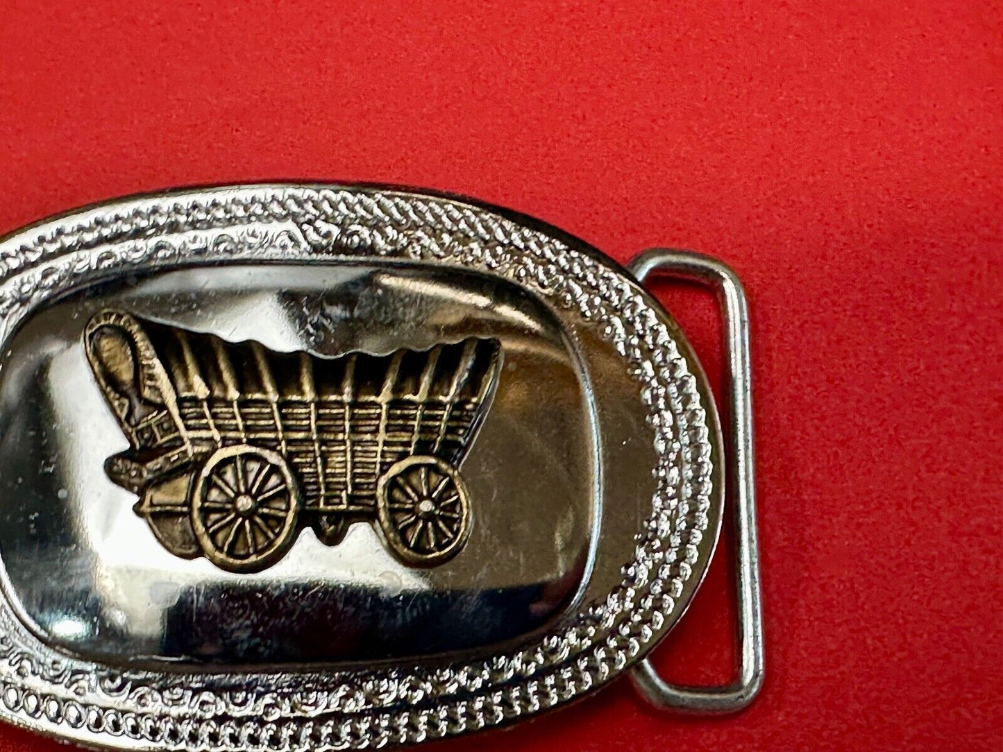 Vintage Covered Wagon on reflective oval two tone western belt buckle