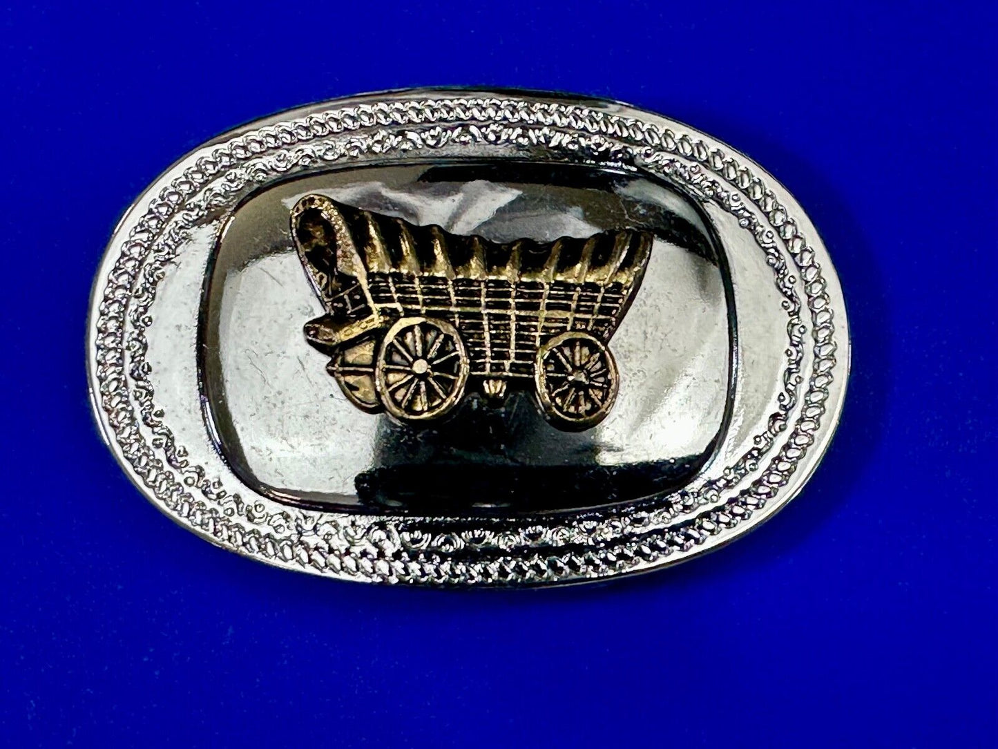 Vintage Covered Wagon - western two tone outlined belt buckle