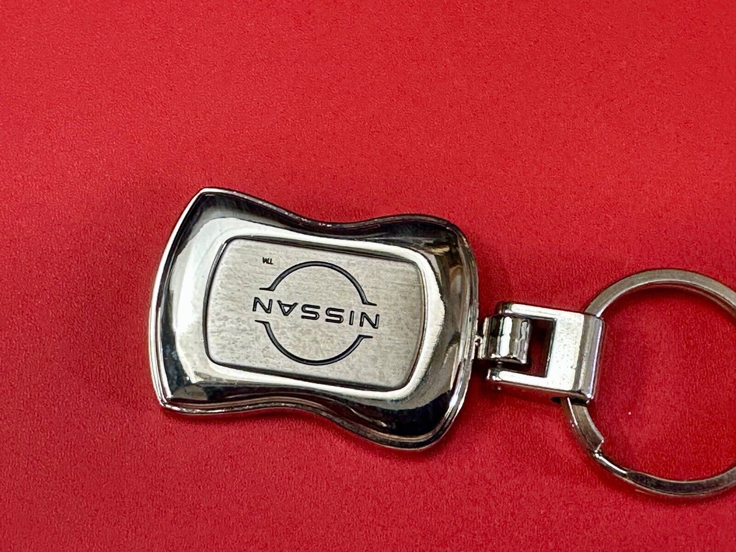 Sutherlin Nissan of Florida car truck dealers logo emblem Keychain - Key Ring