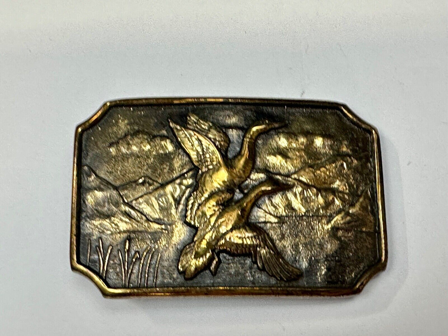 Two ducks flying from pond cat tails Nature Solid Brass belt buckle by BTS