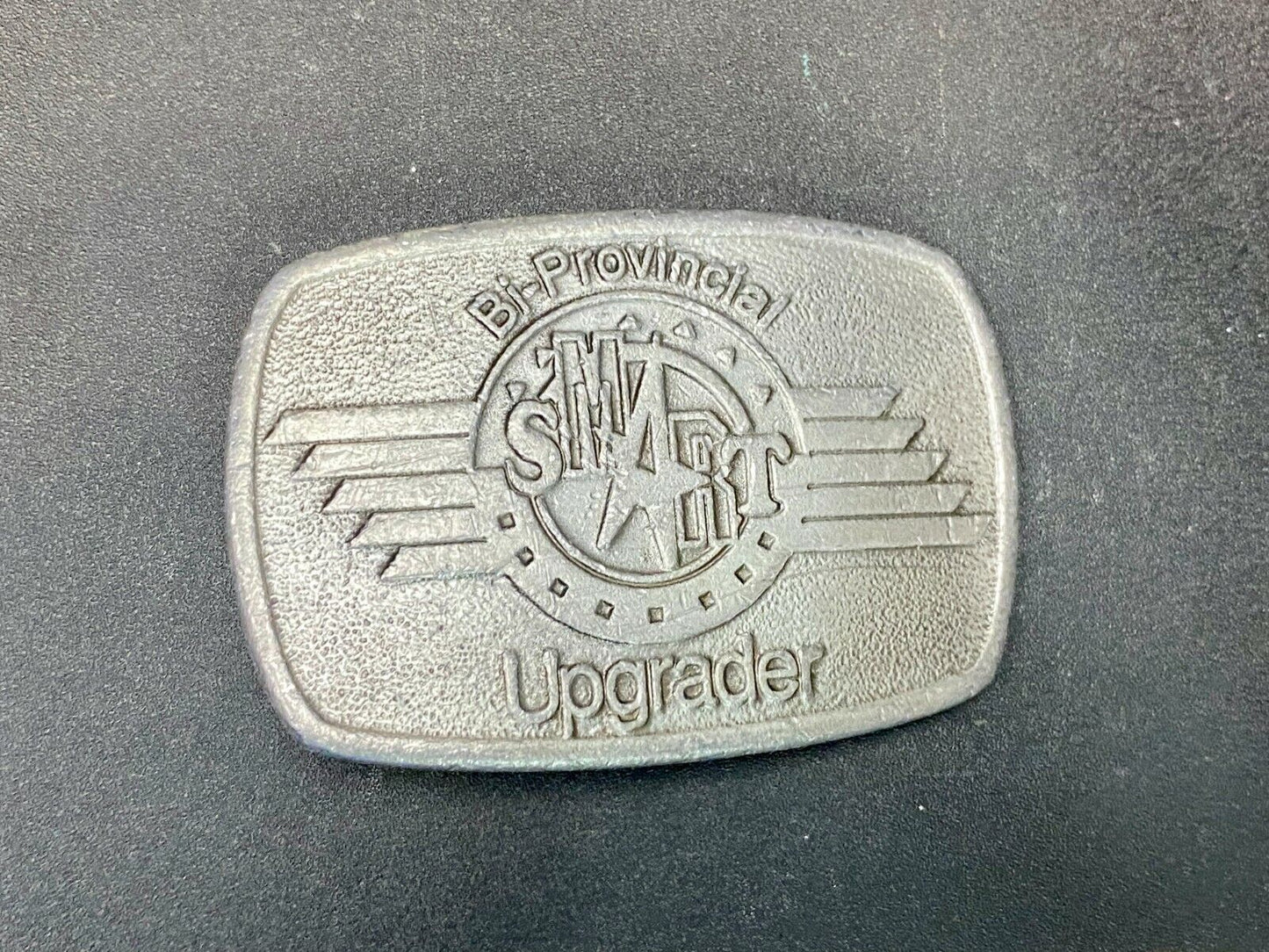 Bi-Provincial Smart Sm Art Upgrader Belt Buckle By Ad Ventures Studios