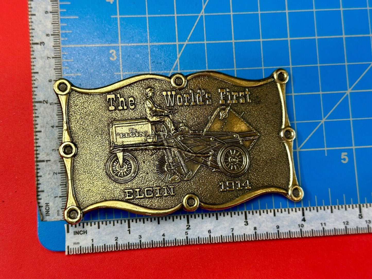 The Elgin, The worlds first tree sweeper commemorative belt buckle by Lewis