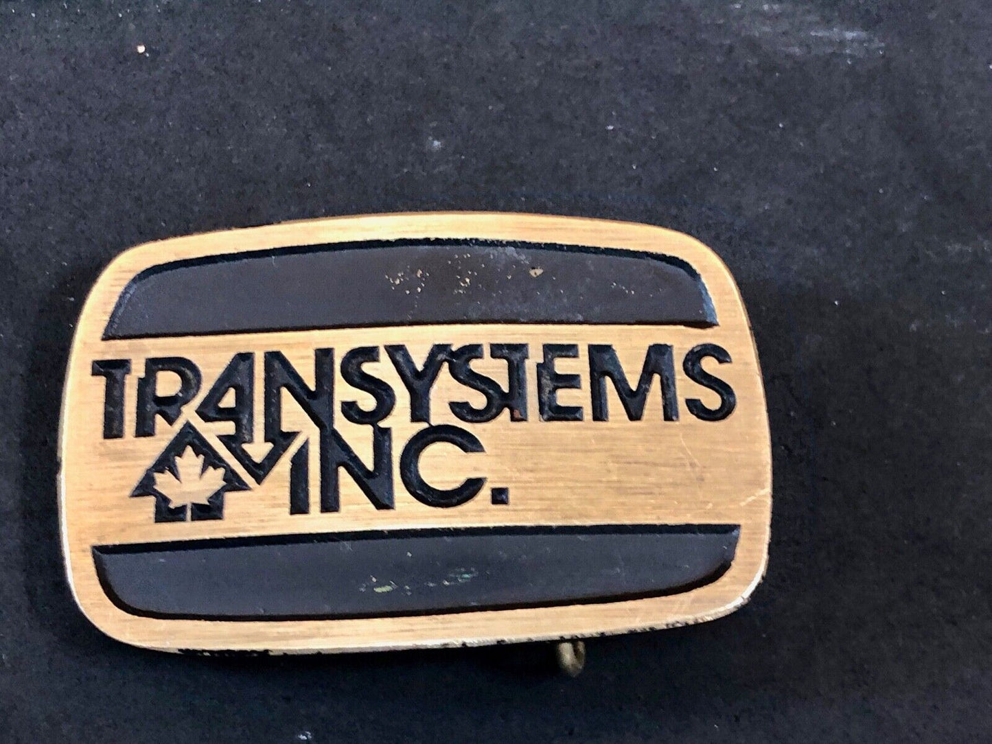 transystems inc Canada Promo belt buckle -a Construction engineering company