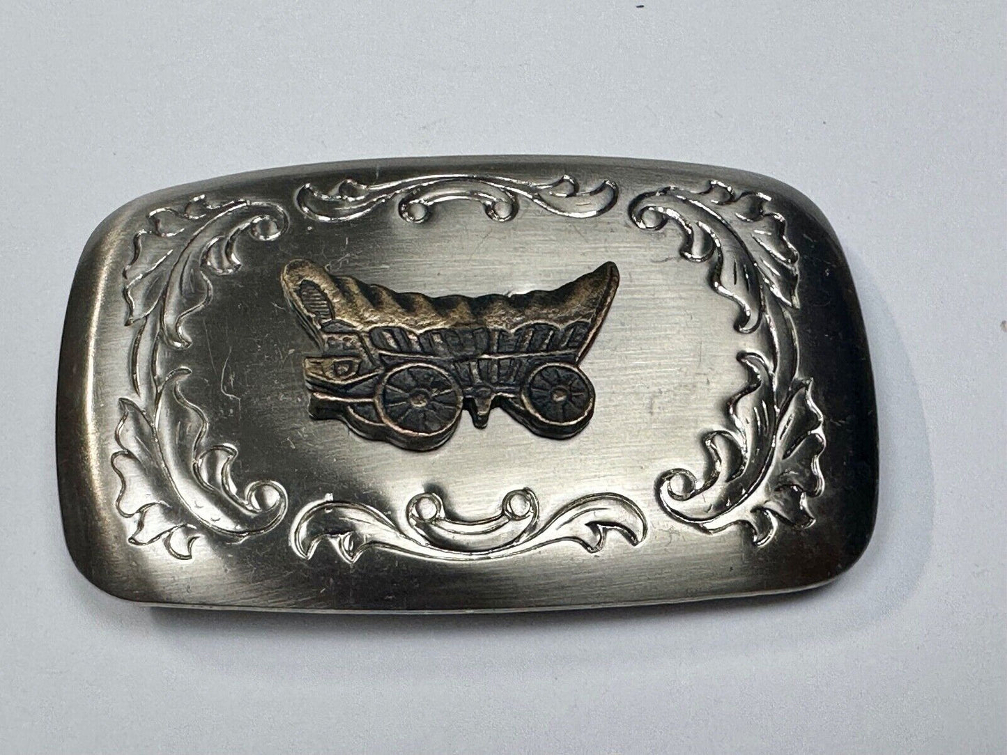 Vintage covered wagon two tone western mixed metal belt buckle