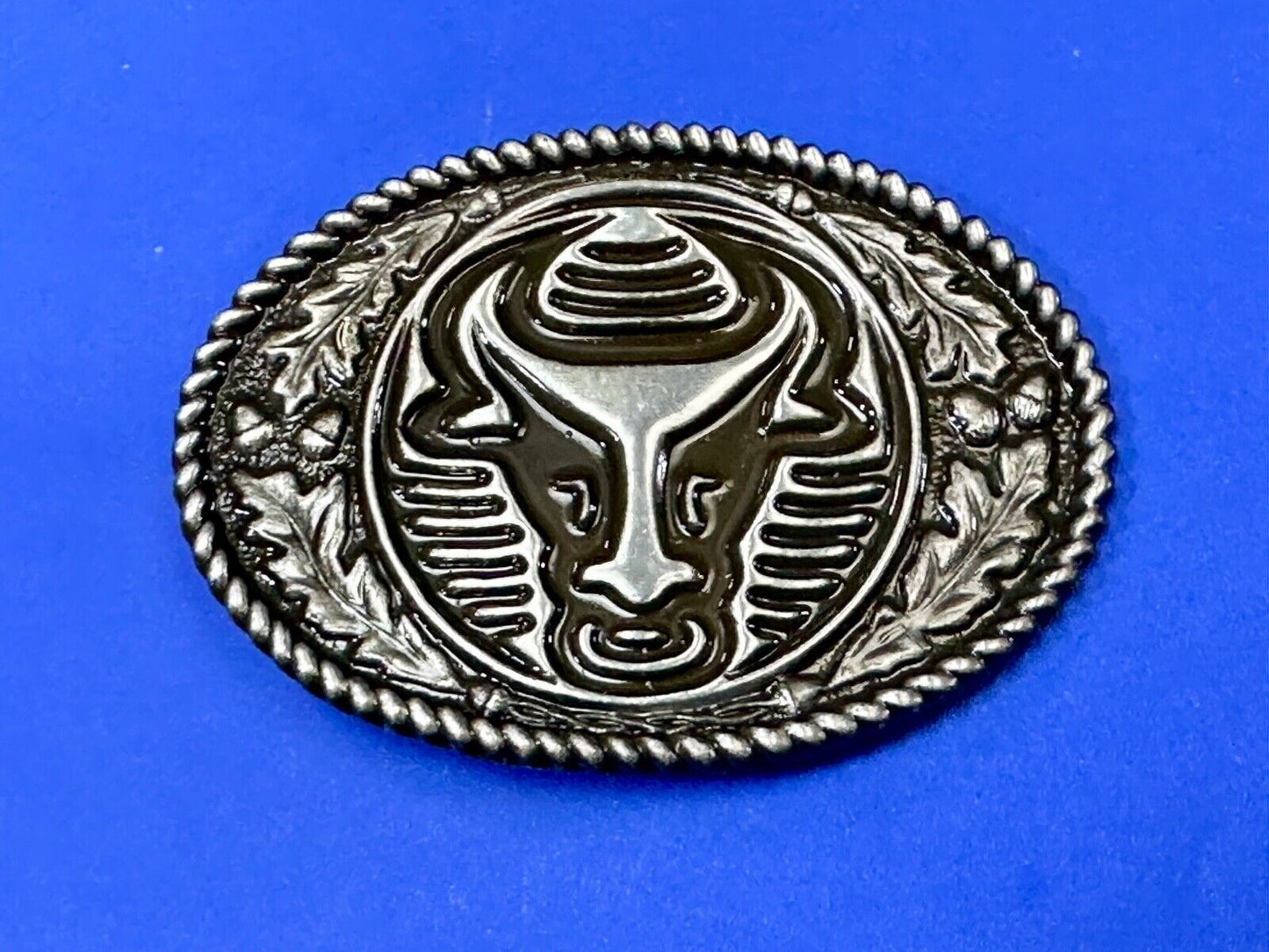 The Longhorn cow steer with nose ring Vintage rope boarder belt buckle