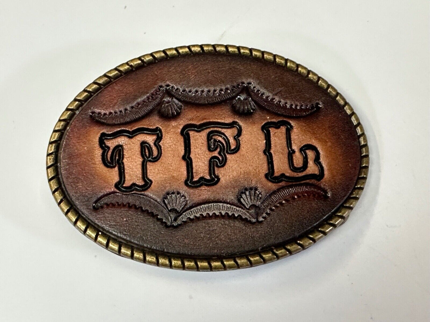 TFL. vintage western initials letters on leather belt buckle