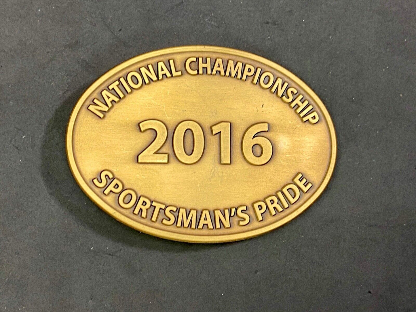2016 National Championship Sportsman's Pride Gold Tone Oval Belt Buckle