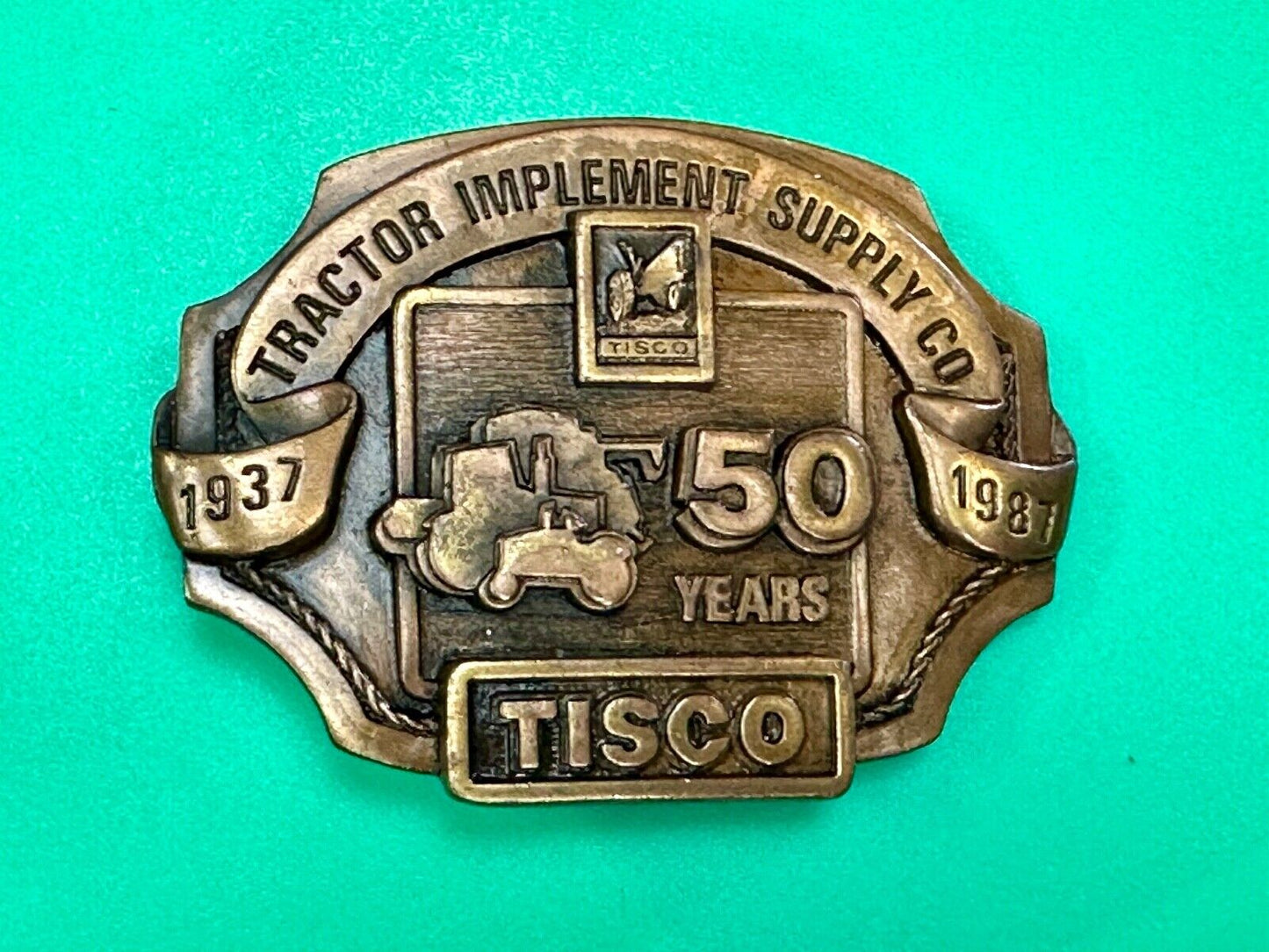 Tisco 50 year celebration Tractor farm supply company promo 1986 belt buckle