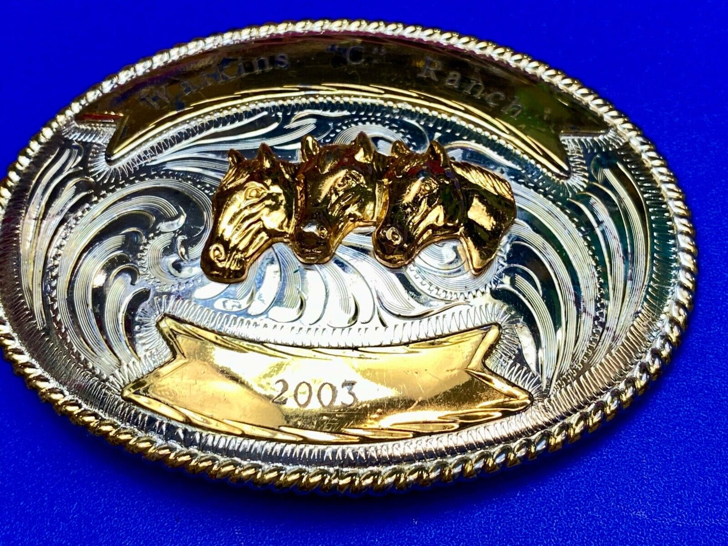 Three Horse heads silver tone? western belt buckle from Mexico- engraved ribbon