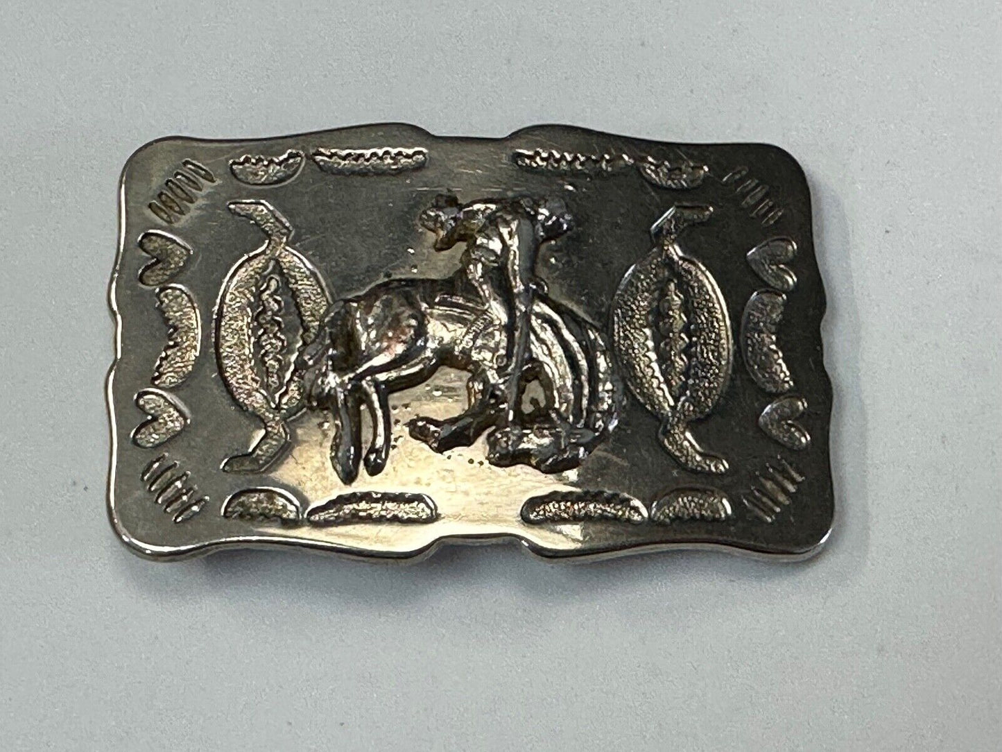 Vintage Cowboy Tipping Hat Head down Saddle Bronc western belt buckle