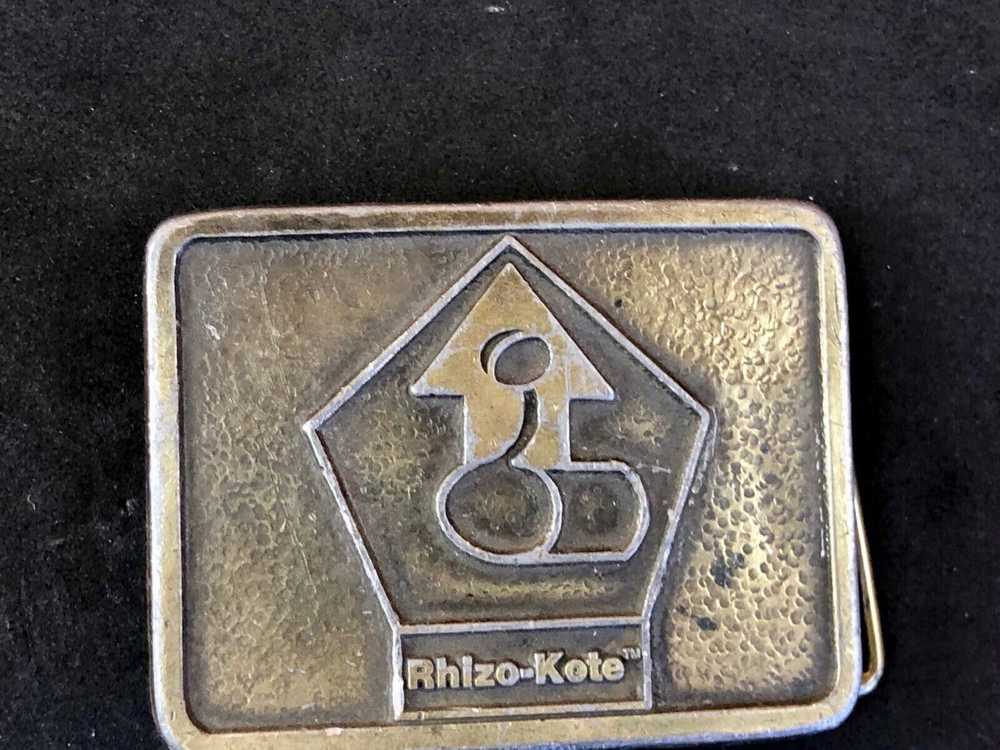 Vintage advertising Rhizo kote seal coating company belt buckle