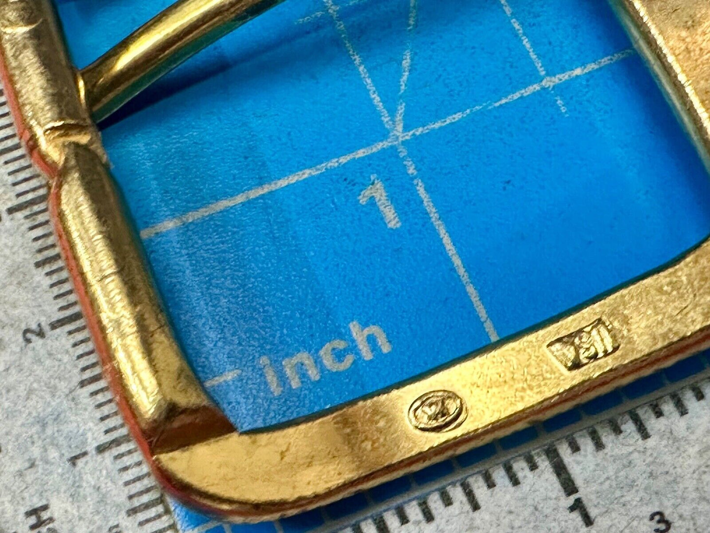 Vintage replacement belt buckle marked W with unique angle