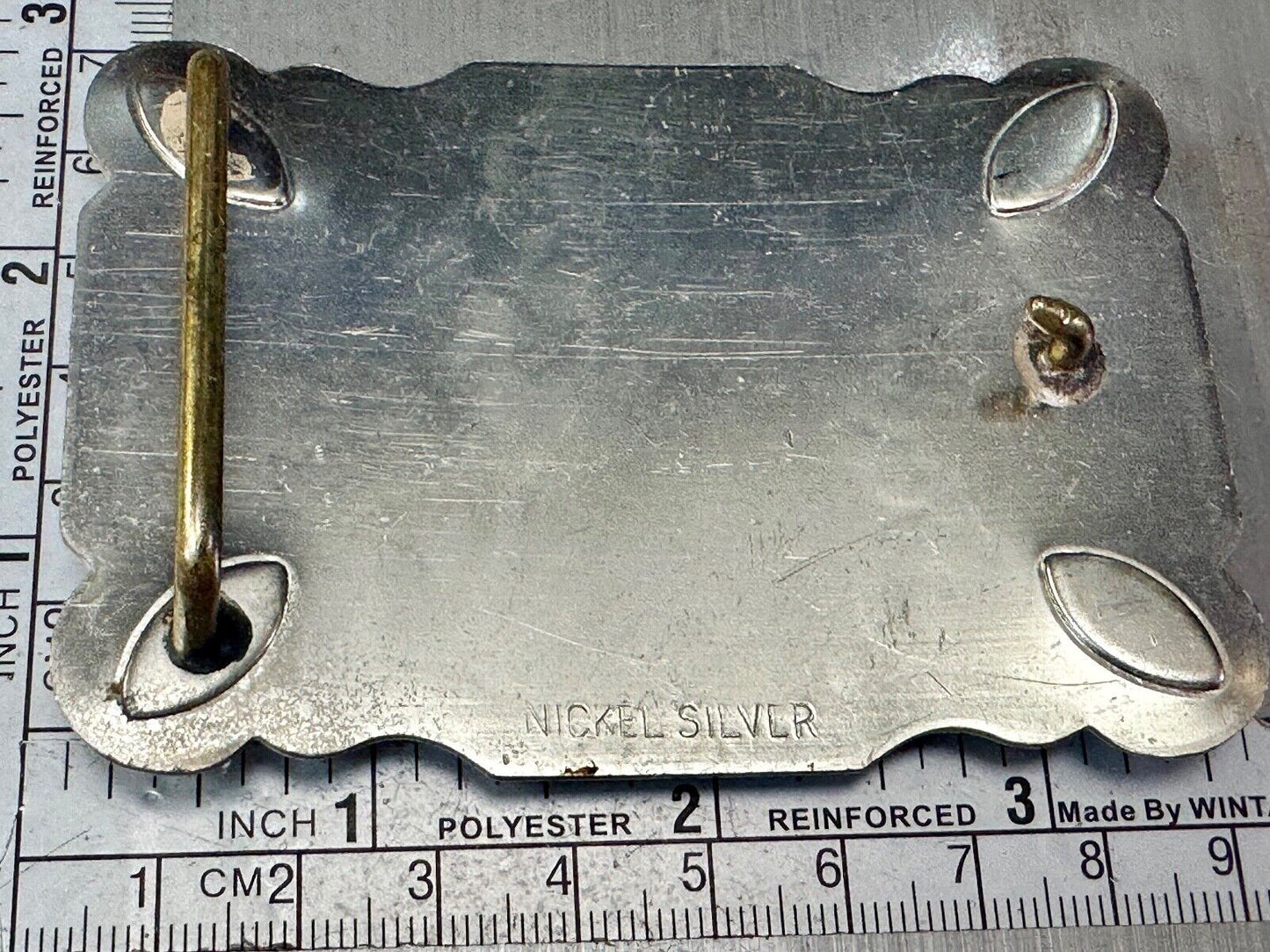 The Longhorn cow steer western nickel silver belt buckle with turquoise accents