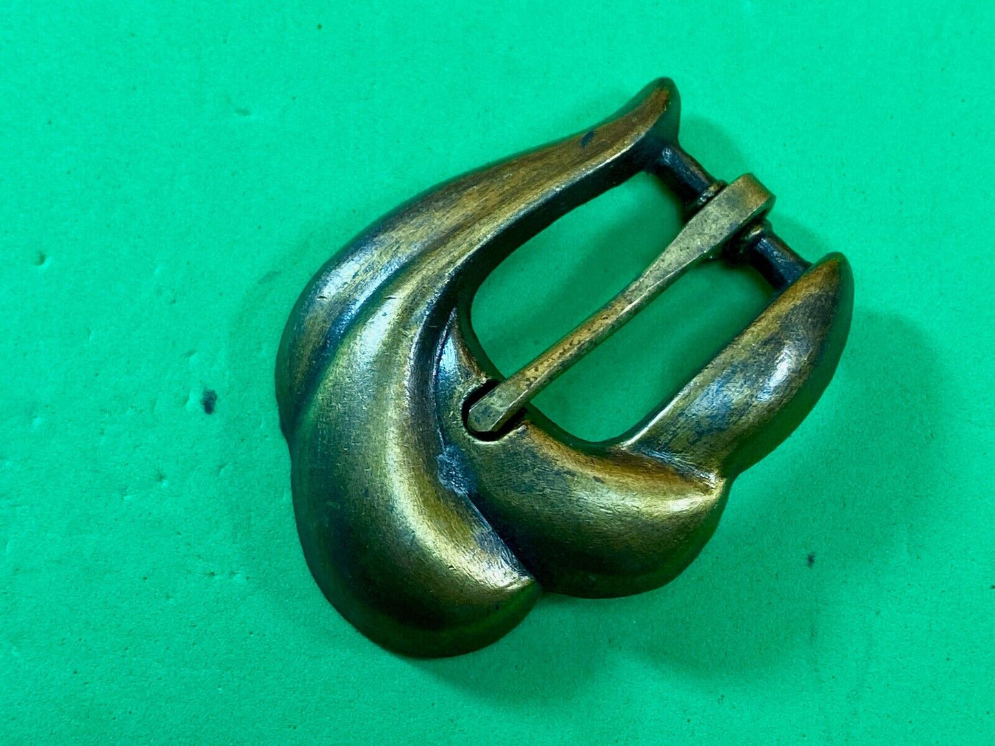 apple acc of New York stamped gold tone retro belt buckle