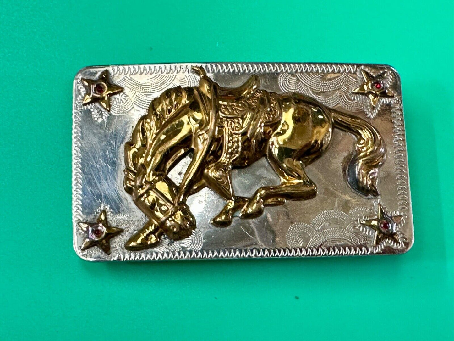 Vintage Horse w/ head down end of the trail Nickel Silver belt buckle w/ Stars