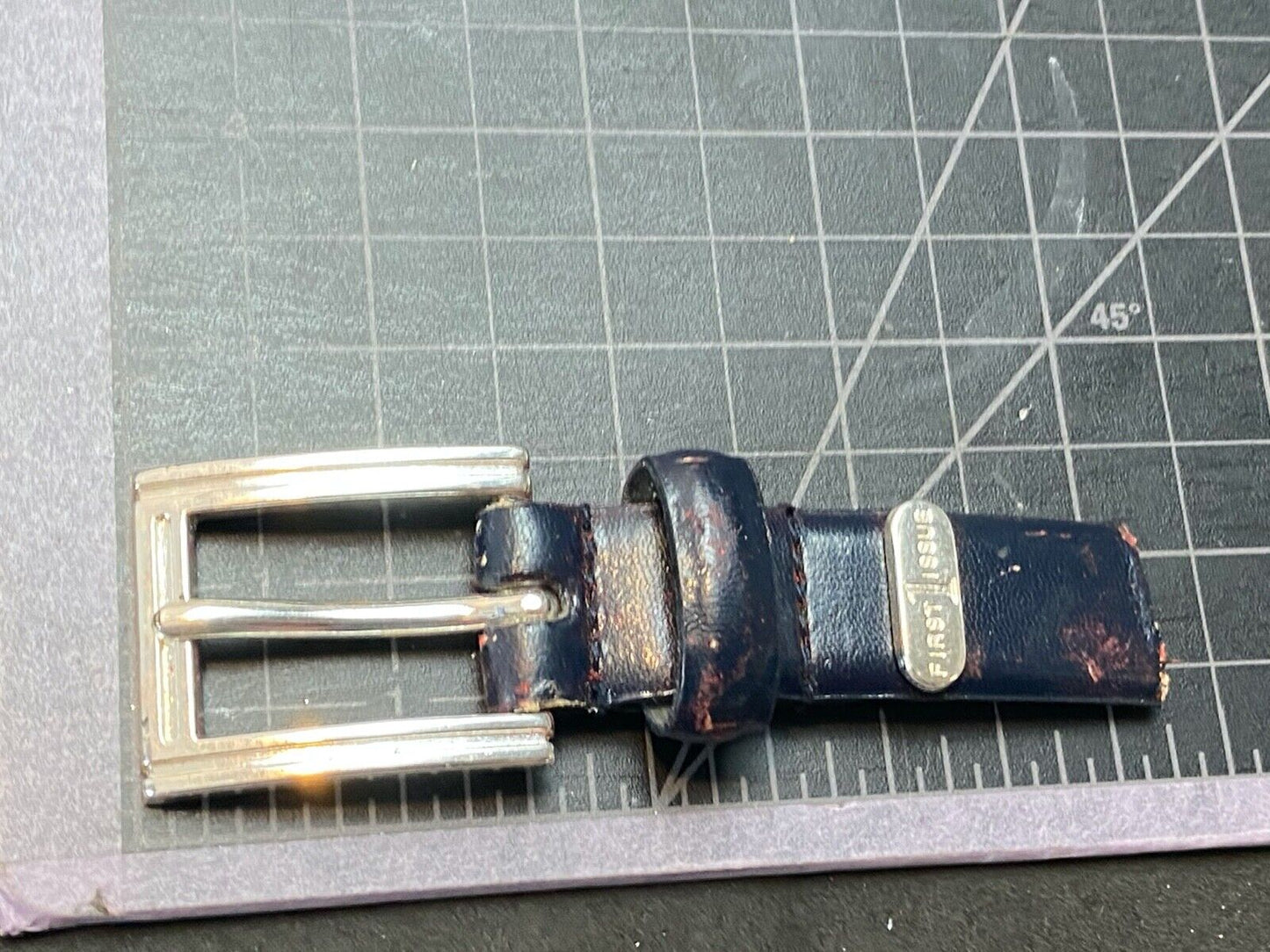 Vintage 1999 FIRST ISSUE dress silver tone belt buckle