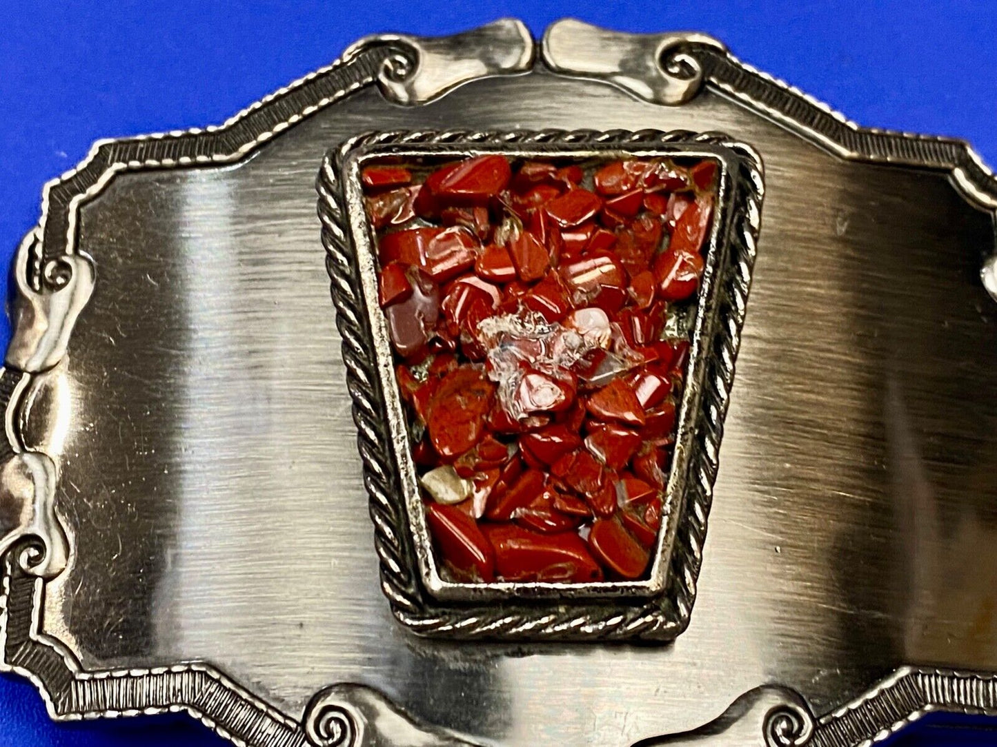 Vintage chunky red stones in centerpiece of Western Thick framed belt buckle