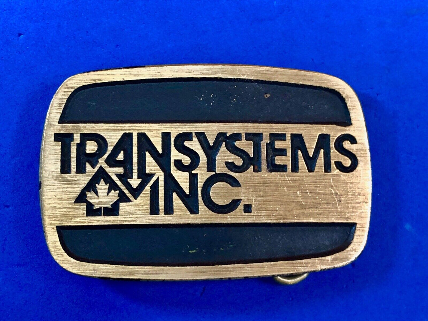 transystems inc Canada Promo belt buckle -a Construction engineering company