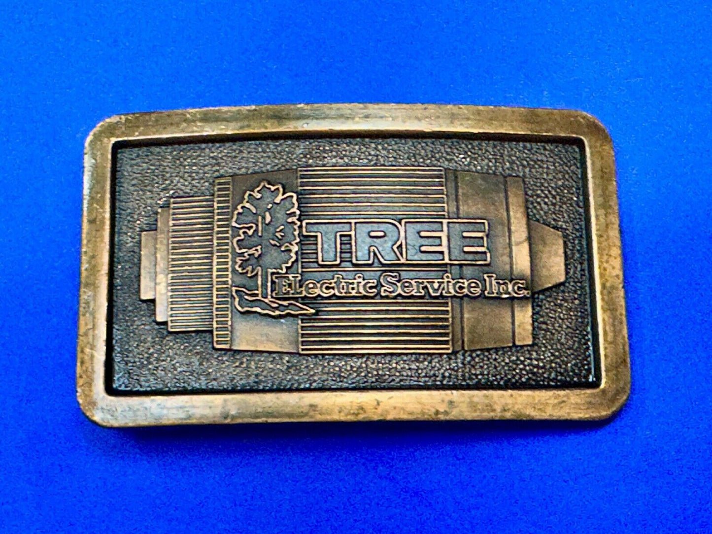 Tree electric service INC Vintage advertising promo brass tone Belt Buckle