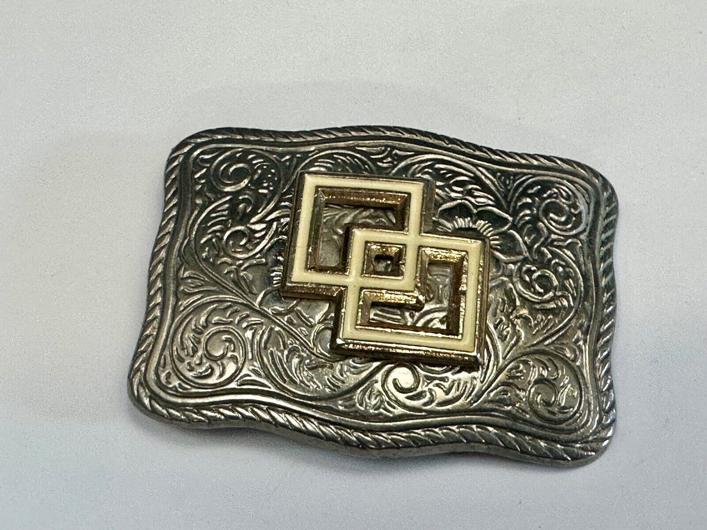 Two Squares pattern - centered in western flower swirl design belt buckle