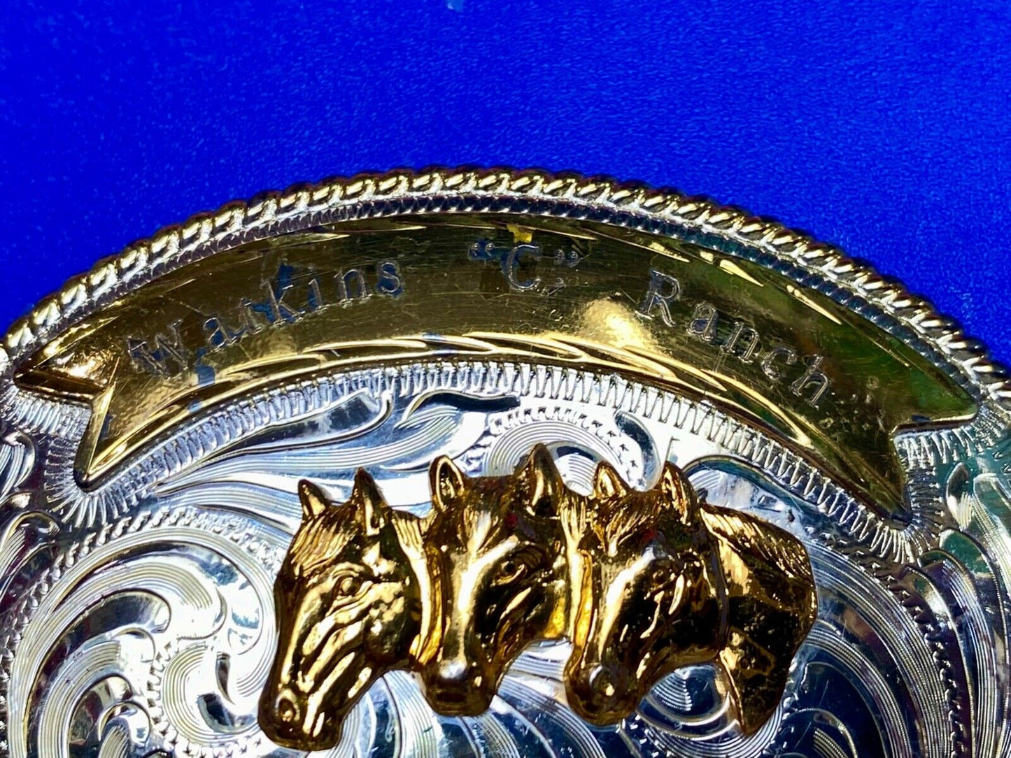 Three Horse heads silver tone? western belt buckle from Mexico- engraved ribbon